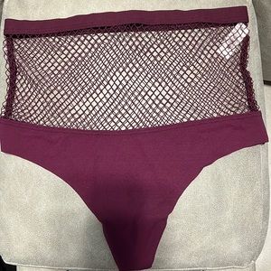 Bands New thong with tags Victoria’s Secret size M , never been worn